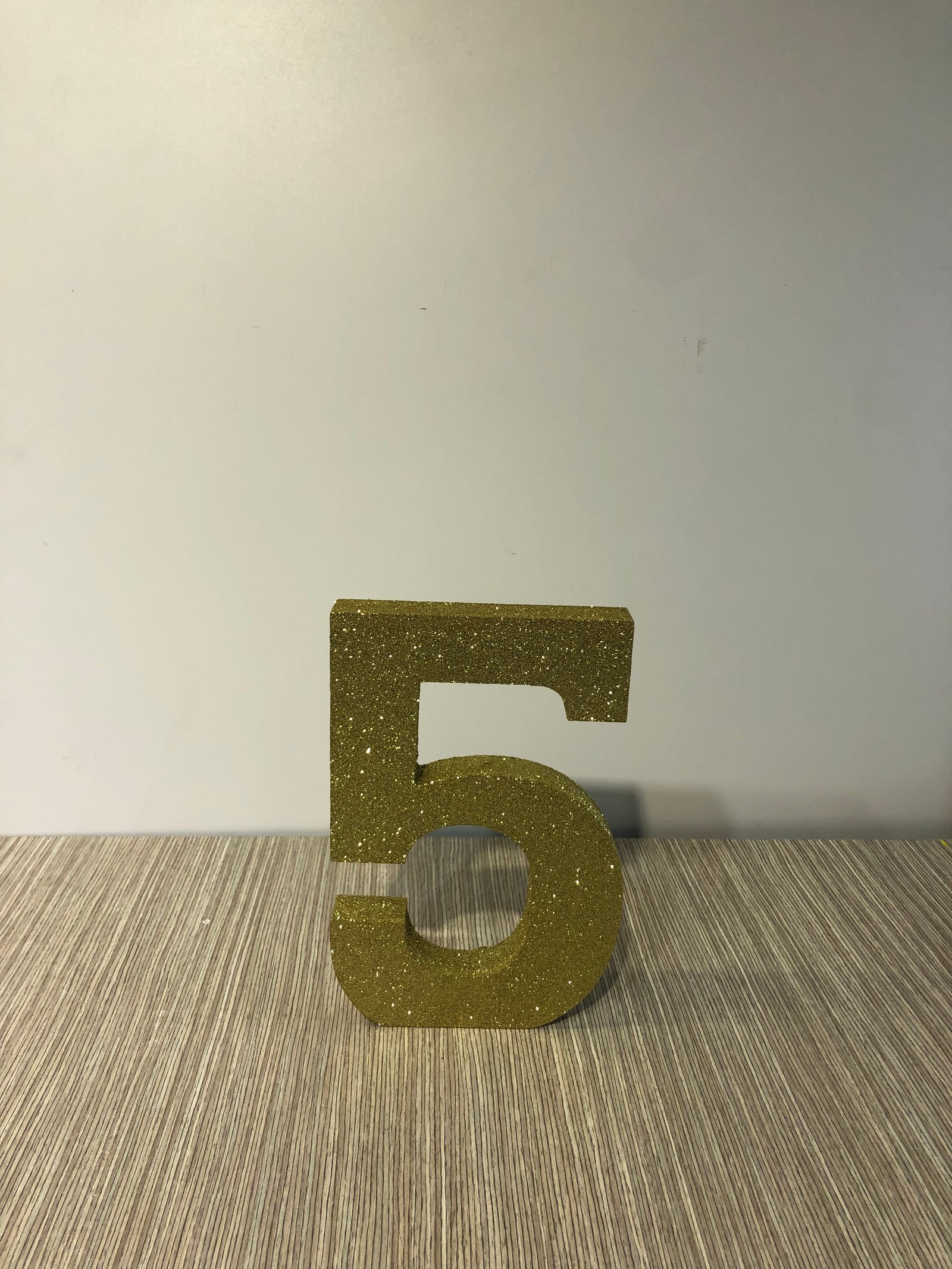 Numero Cinco Mirellas Doradas