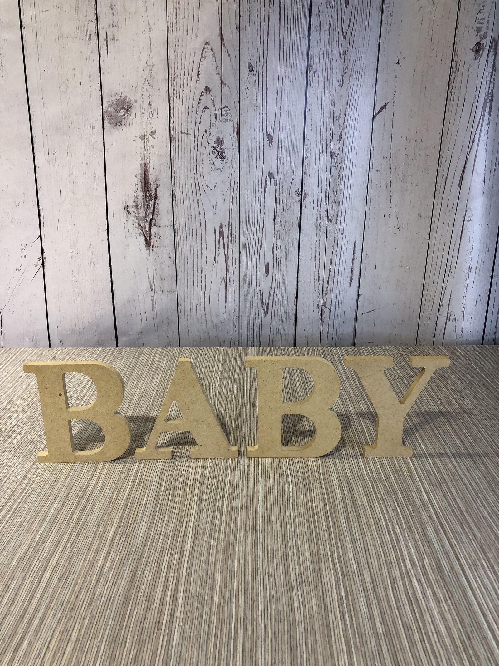 Baby En Madera Cafe Claro