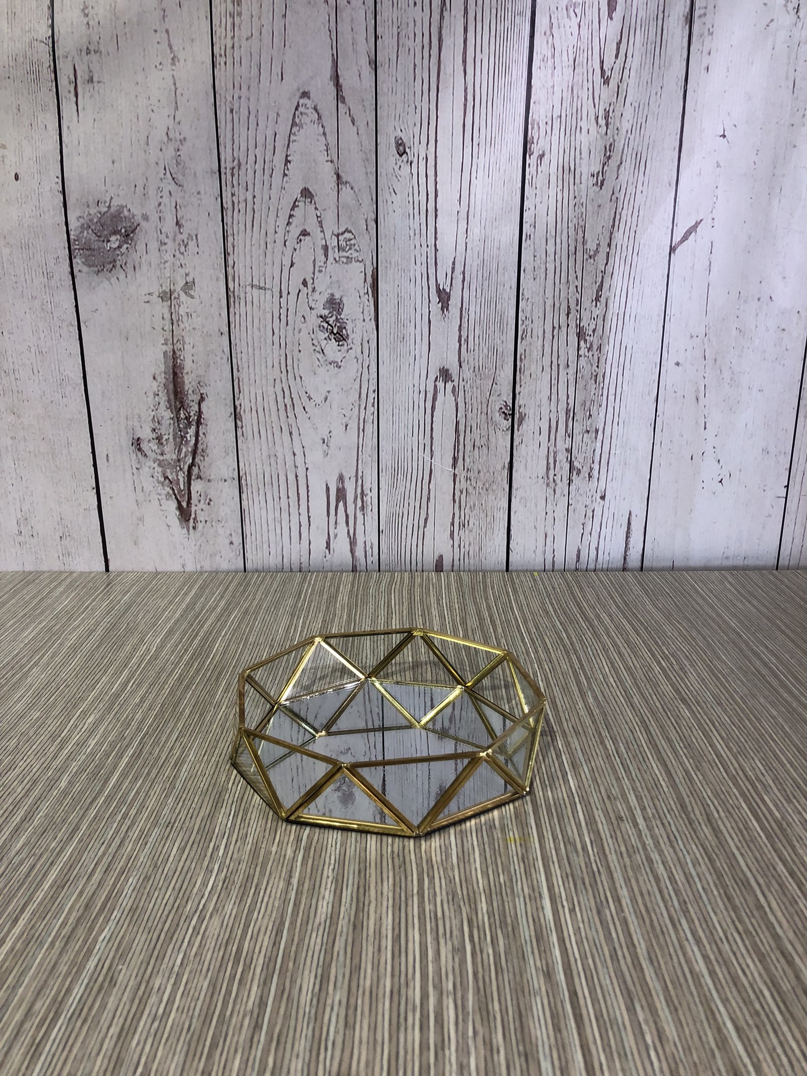 Bandeja redonda dorada y vidrio pequeña