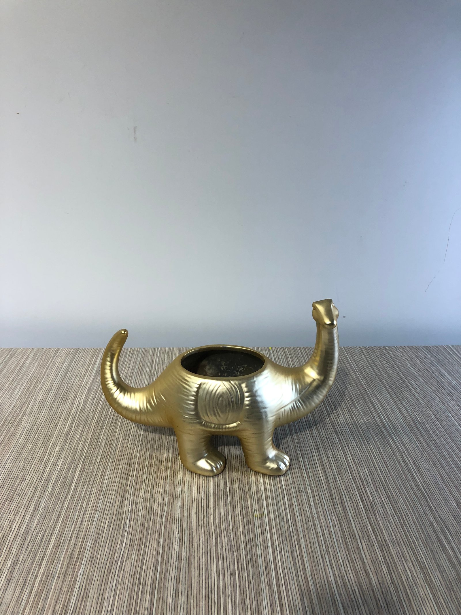 Dinosaurio Metalico Dorado 4 Patas Con Hueco En La Mitad